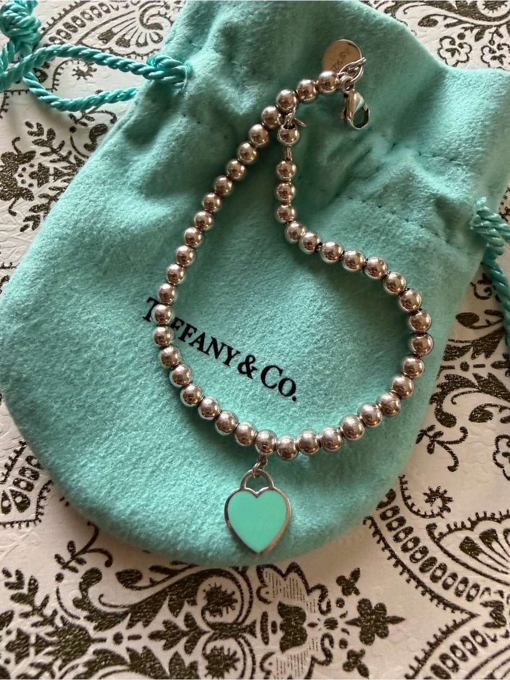 Tiffany & Co. Silver Bead Bracelet with blue Heart Charm